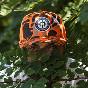 Orange Duck Camo Compass Trucker