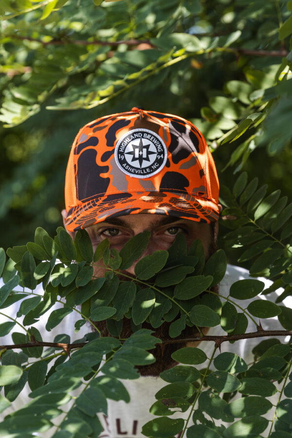 Orange Duck Camo Compass Trucker