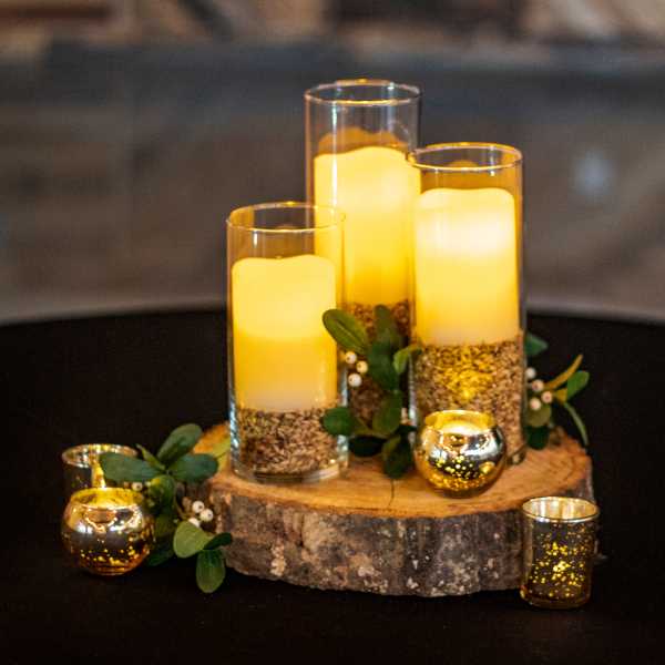 candle vases on tree slab